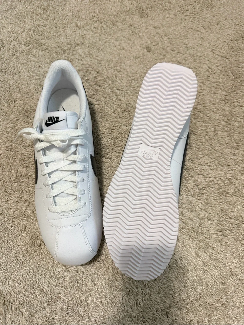 Nike Men's White Sneakers with Black Swoosh